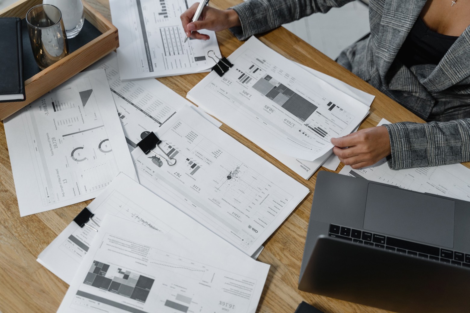 Budget papers scattered on a desk