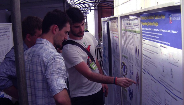 Presenter showing his poster