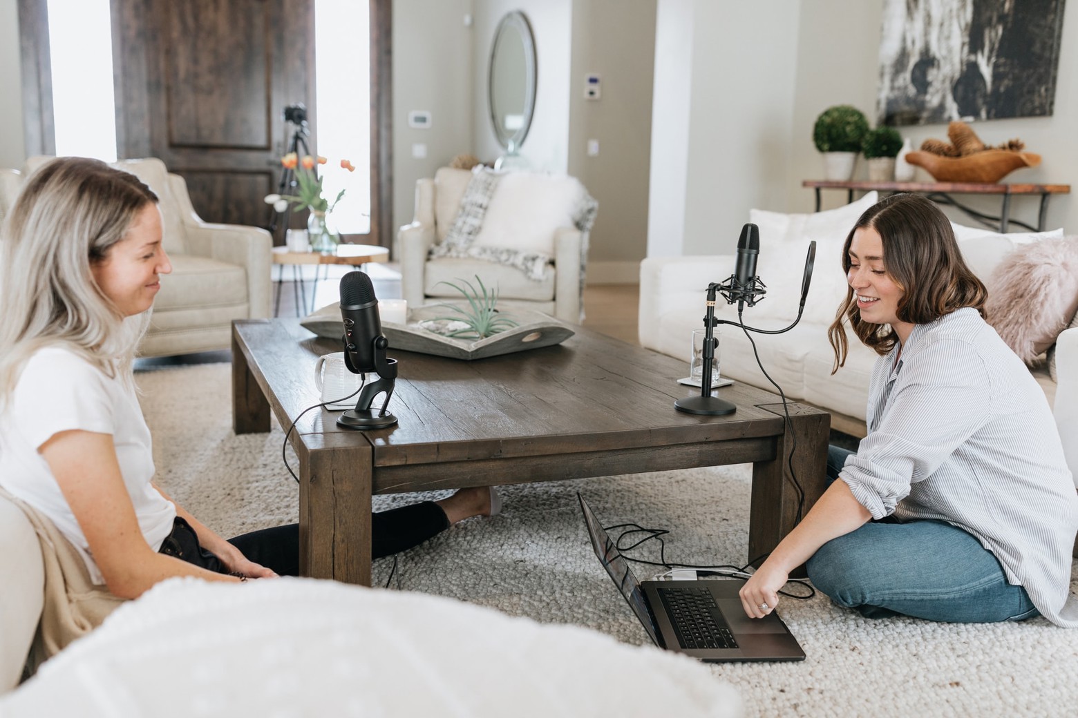 Two person registering a podcast